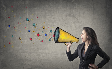 woman shouting in to megaphone